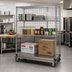 Thumbnail image #2 for Quantum Mobile Wire Enclosed Dolly Truck Cart with 4 Shelves, 48 x 24 x 80 Inches, Chrome Plated