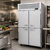 Thumbnail image #2 for Turbo Air PRO Series 48.06 Cu. Ft. Two-Section Reach-In Freezer, Top-Mount Self-Contained, Solid Half Doors