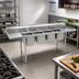 Thumbnail image #2 for Eagle Group 314 Series Four-Compartment Coved Corner Sink with 24-Inch Left Drainboard, 304 Stainless Steel