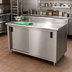 Thumbnail image #2 for Advance Tabco 60 Inch x 24 Inch Enclosed Work Table with Cabinet Base, Sliding Doors, and 5 Inch Backsplash