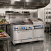 Thumbnail image #2 for 60-Inch Stainless Steel Gas Range with 4 Star Burners, 24-Inch Griddle, 12-Inch Char-Broiler, and Double Ovens