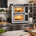 Thumbnail image #2 for PizzaMaster PM 352ED-2 Countertop Electric Stone Hearth Pizza Oven, 2 Chambers, 4 Hearthstones