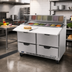 Thumbnail image #3 for Beverage-Air SPED48HC-12C-4 Two-Section 48-Inch Sandwich Prep Table with 4 Drawers and 17-Inch Cutting Board