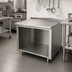 Thumbnail image #2 for Advance Tabco Stainless Steel Work Table with Open Front Cabinet Base, 36 Inch W x 24 Inch D, 1-1/2 Inch Rear Backsplash