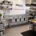 Thumbnail image #2 for Advance Tabco Regaline 4-Compartment Commercial Sink with Left and Right Drainboards