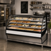Thumbnail image #3 for True 77 1/4-Inch Countertop Dry Pastry Display Merchandiser with Lift-Up Curved Glass Front, Glass Ends and Stainless Steel Exterior