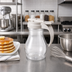 Thumbnail image #2 for Dripcut 10 oz Clear Polycarbonate Syrup Dispenser with Almond Plastic Top