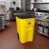Thumbnail image #2 for Rubbermaid Commercial BRUTE 50-Gallon Yellow Roll-Out Trash Cart with Hinged Lid