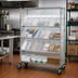 Thumbnail image #2 for Quantum Slanted Shelf Enclosure Cart with Clear Bins, 48W x 18D x 69H, Chrome Plated