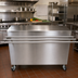 Thumbnail image #2 for BK Resources 60 Inch x 30 Inch Stainless Steel Serving Counter with 12-1/2 Inch Drop Shelf