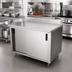Thumbnail image #2 for Advance Tabco Enclosed Work Table with Cabinet Base, Mid-Shelf, Sliding Doors, 48 x 36 Inch, 14 Gauge 304 Stainless Steel Top, 5 Inch Backsplash
