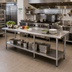 Thumbnail image #2 for Advance Tabco 120 Inch x 24 Inch Stainless Steel Work Table With Adjustable Undershelf and 1-1/2 Inch Rear Up-Turn