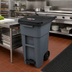 Thumbnail image #3 for Rubbermaid Commercial BRUTE 32 Gallon Step-On Rollout Trash Container with Hinged Lid