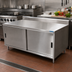 Thumbnail image #2 for BK Resources 72 x 36 Inch Stainless Steel Enclosed Chef Table with Cabinet Base and Sliding Doors