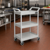 Thumbnail image #2 for Rubbermaid Commercial Products Platinum 3-Shelf Plastic Utility Bus Cart with Swivel Casters