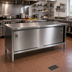 Thumbnail image #2 for John Boos Enclosed Stainless Steel Work Table with Sliding Door Cabinet Base, 120-Inch x 30-Inch, 14-Gauge Flat Top