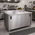 Thumbnail image #2 for Advance Tabco 108 Inch W x 36 Inch D Enclosed Work Table with Cabinet Base, Mid-Shelf, Sliding Doors, and 1-1/2 Inch Rear Up-Turn