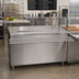 Thumbnail image #2 for BK Resources Stainless Steel Cashier-Serve Counter with Hinged Doors, Urn Trough, and Drop Shelf, 48