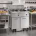 Thumbnail image #2 for Imperial IFSSP350E Triple-Tank Electric Floor Fryer with Built-In Space Saver Filter System, 50 lb. Tanks
