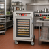Thumbnail image #2 for Metro C5 6 Series Mobile Half-Height Pass-Thru Heated Holding Cabinet with Double-Pane Tempered Glass Doors, 17 Pan Capacity
