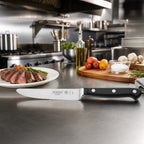 Thumbnail image #2 for Mundial 5128-5E 5-Inch Forged Steak Knife with Serrated High-Carbon Stainless Steel Blade and Black Polyacetal Handle Case of 6