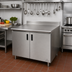 Thumbnail image #2 for Advance Tabco Special Value Economy Enclosed Work Table with Cabinet Base and Hinged Doors, 48 x 24 Inches, 16-Gauge 304 Stainless Steel Top, 5-Inch Backsplash