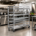 Thumbnail image #3 for Channel Manufacturing Aluminum Glass/Oval Tray Mobile Shelf Truck / Flight Cart, 75 x 25 x 72 Inches, 4 Shelves