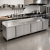 Thumbnail image #2 for John Boos Enclosed Stainless Steel Work Table with Cabinet Base and 3 Hinged Door Sets, 132 x 30 Inches, 5-Inch Backsplash