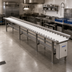 Thumbnail image #2 for Dinex DXIESR20 Tray Make-Up Conveyor with PVC Rollers, 20-Foot Section