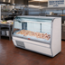 Thumbnail image #2 for Howard-McCray 32E Series 50-Inch Curved Glass Remote Fish & Poultry Service Case with LED Lighting