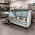 Thumbnail image #2 for Howard-McCray 40E Series SC-CFS40E-4C-LED Fish and Poultry Curved Glass Self-Contained Refrigerated Display Case, 51.5 Inch, White