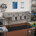Thumbnail image #2 for Advance Tabco Regaline 4-Compartment Stainless Steel Sink with Left & Right Drainboards, 24