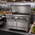 Thumbnail image #2 for Garland GF Starfire Pro 48-Inch Gas Restaurant Range with 6 Open Burners, 12-Inch Thermostatic Griddle, and 2 Space-Saver Ovens