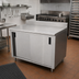Thumbnail image #2 for Advance Tabco Special Value Economy Enclosed Work Table with Cabinet Base, 108W x 24D, 16 Gauge 304 Stainless Steel Top, 5 Inch Backsplash