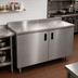 Thumbnail image #2 for Advance Tabco 84-Inch x 24-Inch Enclosed Work Table with Cabinet Base, Mid-Shelf, Hinged Doors, 14-Gauge 304 Stainless Steel Top, and 5-Inch Backsplash