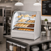Thumbnail image #2 for True 36-1/4 Inch Curved Glass Dry Pastry Display Case with Stainless Steel Exterior and White Interior