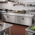 Thumbnail image #2 for Advance Tabco Heavy-Duty Flat-Top Stainless Steel Enclosed Work Table with Cabinet Base, Mid-Shelf and Hinged Doors, 108 x 30 Inches