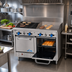Thumbnail image #2 for Comstock-Castle 48-Inch Commercial Gas Char-Broiler Range with 24-Inch Griddle, 24-Inch Char-Broiler, and 2 Space-Saver Ovens