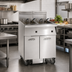 Thumbnail image #2 for Imperial IFSSP275EU Electric 2-Tank Floor Fryer with Built-In Space Saver Filter System, 75 lb. per Tank, Tilt-Up Elements