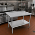 Thumbnail image #2 for John Boos Stallion 60 Inch x 24 Inch 14 Gauge Stainless Steel Top Work Table with 1-1/2 Inch Rear Up-Turn and Galvanized Undershelf
