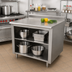 Thumbnail image #2 for Advance Tabco 60-Inch x 36-Inch Open Front Cabinet Work Table with Mid-Shelf, 14 Gauge 304 Stainless Steel Top and 5-Inch Backsplash