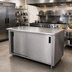 Thumbnail image #2 for Advance Tabco Stainless Steel Work Table with Cabinet Base, Mid-Shelf and Sliding Doors, 108 x 36 Inches, 14 Gauge 304 Top