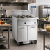 Thumbnail image #2 for Imperial IFSSP375EUC 3-Battery Electric Floor Fryer with Space Saver Filter System, 75 lb. Tanks, Tilt-Up Elements, Computer Controls