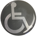 Thumbnail image #1 for JustChair Manufacturing ADA-DOME-LABEL ADA Tabletop Sticker, 2" Round, Domed Acrylic, Permanent Adhesive, White/Grey on Brushed Silver