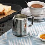 Thumbnail image #2 for New Star Foodservice Inc. 28805 12 oz 18/8 Stainless Steel Frothing Pitcher with Handle Case of 36