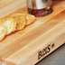 Thumbnail image #2 for John Boos Boos Block Reversible Edge Grain Maple Cutting Board with Hand Grips, 24 x 18 x 2-1/4 Inches