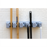 Roll N' Grip Plus Wall-Mount Broom/Brush Holder, 16-1/2 x 5 x 3-1/2 Inches, ABS Plastic, Light Blue